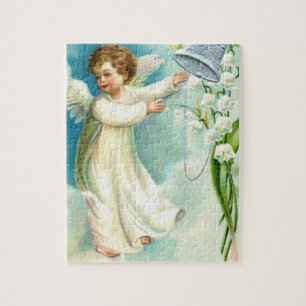 Baby Engel mit blauer Glocke