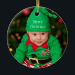 Baby Foto von Elf Merry Christmas Keramik Ornament<br><div class="desc">Cute baby dressed as holiday foto with merry Christmas. Replace this image with with your baby's foto. You may keep the merry Christmas text or delete it. Cute red green elf outfit with liebenswerter Smiling Baby. Sammt Keepsake every year and watch baby grow!</div>