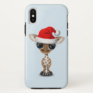 Baby-Giraffe, die eine Weihnachtsmannmütze trägt title_seo2