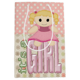 Baby Girl Doll on Quilt Mittlere Geschenktüte