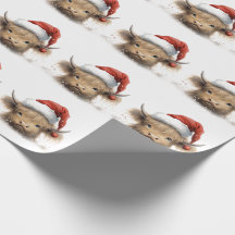 Baby Highland Cow mit Weihnachtsmannmütze
