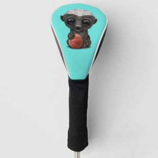 Baby-Honig-Dachs, der mit Basketball spielt Golf Headcover