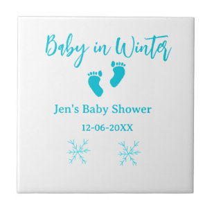 Baby im Winter duschen blaue Babyfüße Schneeflocke Fliese