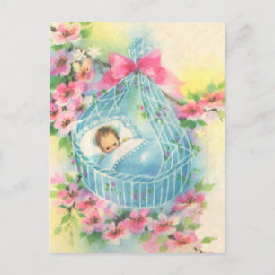 Baby in einem blauen Korb Postkarte
