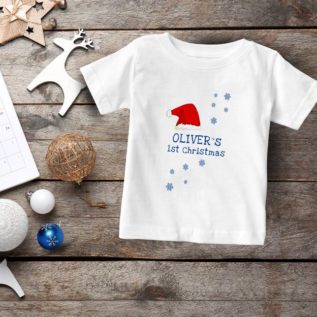 Baby`s erste Weihnachts-Weihnachtsmannmütze Snowfl Baby T-shirt (Von Creator hochgeladen)