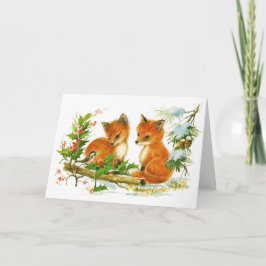 Baby-Weihnachtsfüchse und -vogel mit Stechpalme Feiertagskarte