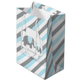 Babydusche mit weißen, blauen und grauen Streifen Mittlere Geschenktüte