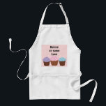 Backen Sie etwas Liebe auf Schürze<br><div class="desc">Eine großartige Schürze für eine Mutter,  Oma oder einen Freund,  der gerne ...  mattierte Kuchen mit Sprinklen backt. Ein zarter rosa Hintergrund mit einem lila Rahmen. Das Sprichwort kann auf Wunsch geändert werden.</div>