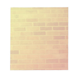 Backsteinmauer in orange und gelbem notizblock