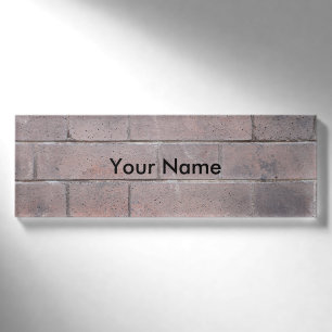 Backsteinmauer Namenschild