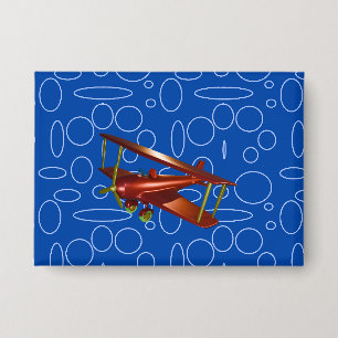 Badge Bi-plan rouge sur les cercles et boucles bleus