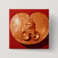 Pectoral avec un visage humain