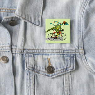Badge Carré 5 Cm Un Dinosaure Anabisetia À Vélo.