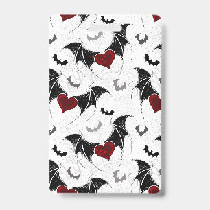 Badge Coeur d'Halloween avec ailes de chauve-souris noir
