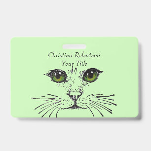 Badge Dessin Joli visage de chat yeux lumineux vert clai