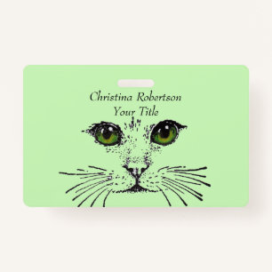 Badge Dessin Joli visage de chat yeux lumineux vert clai
