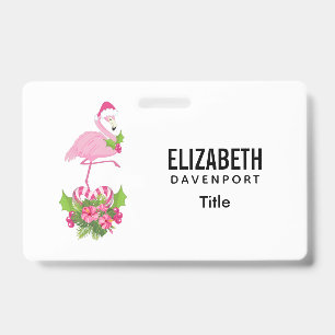 Badge Flamant rose avec un chapeau de Père Noël et bouqu