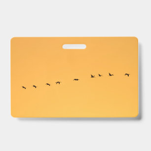 Badge Grues au lever du soleil