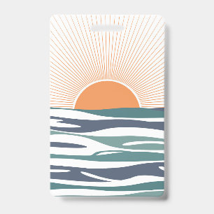 Badge Lever du soleil au bord de la mer