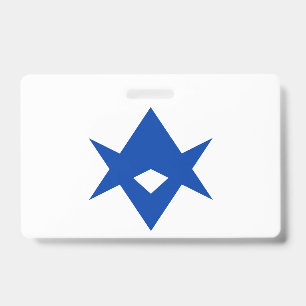Badge nominatif avec le drapeau de la ville de Toy