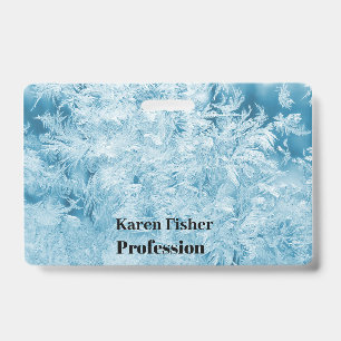 Badge plumes bleues abstraites et flocons de neige