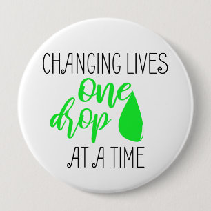 Badge Rond 10 Cm Le changement vit une fan d'huile de la goutte à