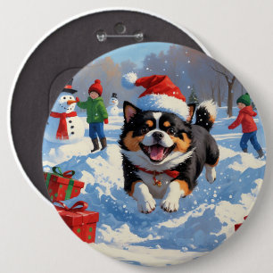 Badge Rond 15,2 Cm Japanese Chin courant dans la neige avec un chapea