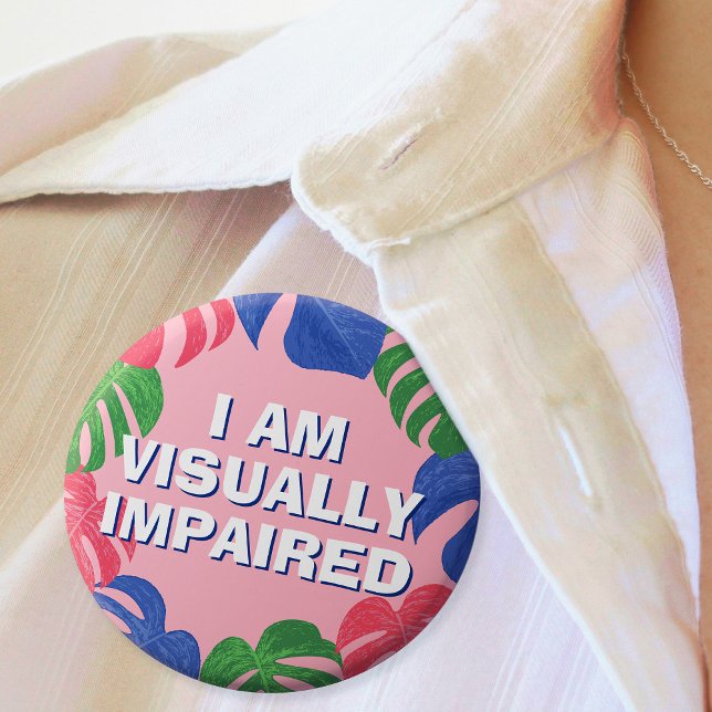 Badge Rond 2,50 Cm Feminine rose Feuilles Tropical Malheureux Visuell (In Situ of badge with colorful leaves border and text "I am visually impaired")