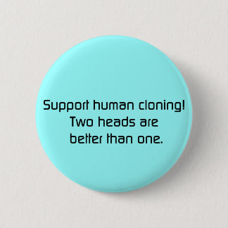 Badge Rond 5 Cm 2 têtes améliorent qu'un bouton