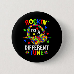 Badge Rond 5 Cm Balancer sur un air différent Autiste Autisme Joue