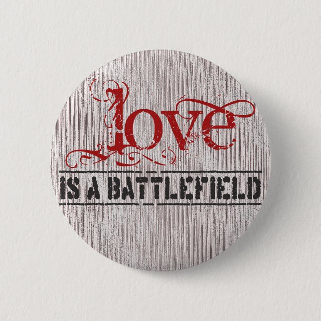 BADGE ROND 5 CM L'AMOUR EST UN CHAMP DE BATAILLE (Devant)