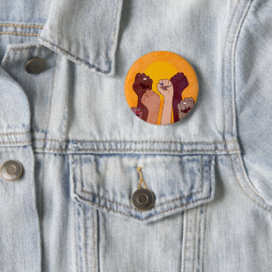 Badge Rond 5 Cm Mains avec poing soulevées sur le soleil jaune