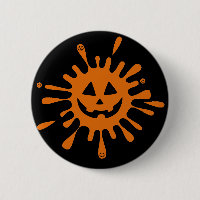 Pointe orange avec visage citrouille