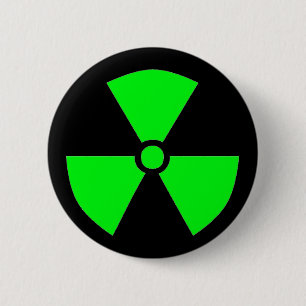 BADGE ROND 5 CM SYMBOLE DE RAYONNEMENT