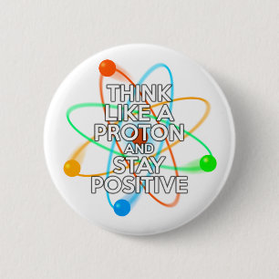 BADGE ROND 5 CM THINK LIKE A PROTON AND STAY POSITIVE