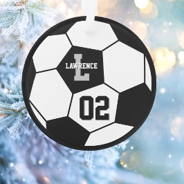 Bal de football et joueur de football Photo