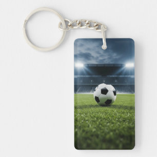 Bal de soccer sur terrain en herbe sous les lumièr