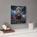 Bald Eagle Wearing an American Flag Cape Quadratische Wanduhr<br><div class="desc">A bald eagle is perched on a tree branch during a thunderstorm,  wearing an American flag and a Native American feather headdress.</div>