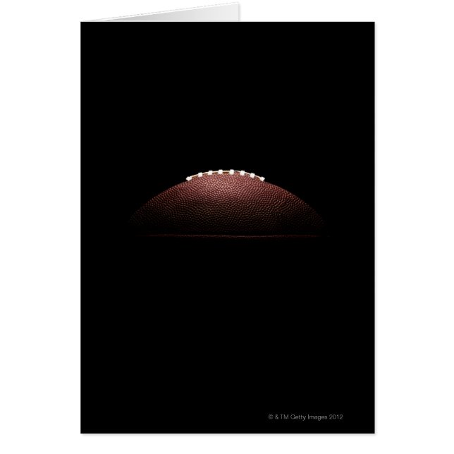 Ball de football américain sur arrière - plan noir (Devant)