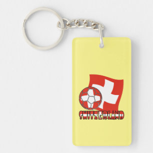 Balle de football avec drapeau suisse sur fond jau