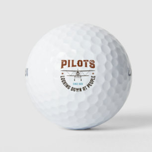 Balles De Golf Des pilotes qui regardent vers le bas