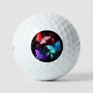 Balles De Golf Trois papillons lumineux sur fond de nuit