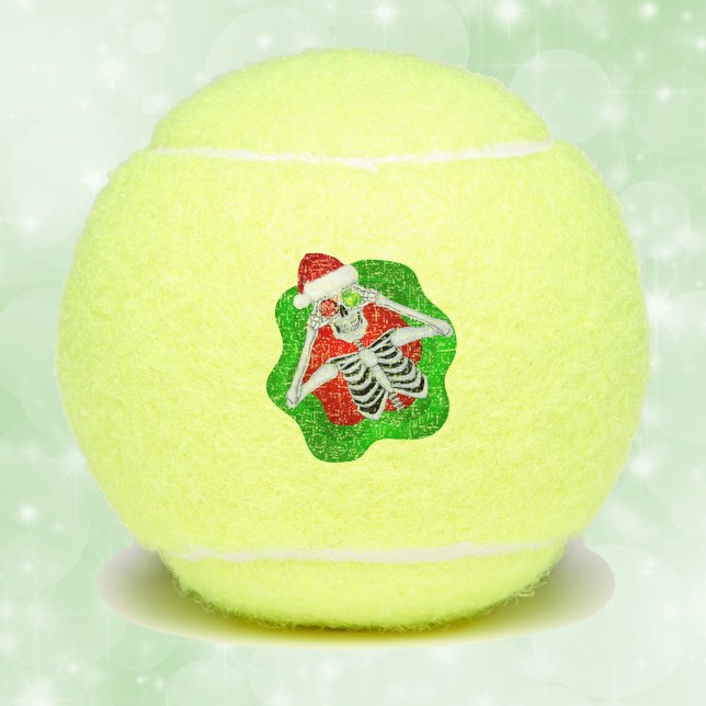 Balles De Tennis Amusants Noël Squelette Ornements Santa Hat Green (Fun Christmas skeleton ornament eyes Santa Hat in green red splatter shape on tennis balls.)