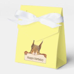 Ballotins Joyeux Anniversaire de l'écureuil tenant un signe 