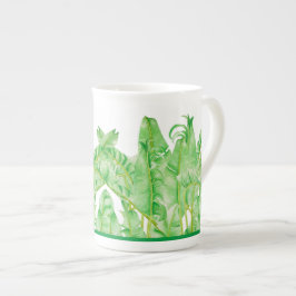 Banana-Blätter auf einer Knochen-China-Tasse Prozellantasse