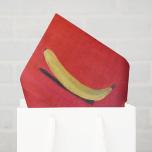 Banane mit rotem Hintergrund Seidenpapier
