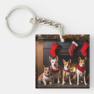 Basenji au coin du feu de Noël