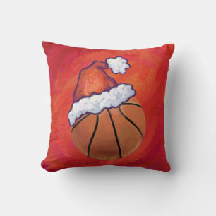 Basketball in Weihnachtsmannmütze Kissen