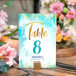 Bat Mitzvah Turquoise Watercolor Giro Gold Script Tischnummer<br><div class="desc">Kein Bat Mitzvah Party ist komplett ohne personalisierte Tischnummer Karten. Lass deinem Lieblings-Bat Mitzvah Stolz, Freude und feiere ihren Meilenstein in ihrem perfekt koordinierten Party. Atemberaubende, moderne, funkelnd Goldfolien handgeschriebene Imitate und winzige Punkte überlagern einen türkisblauen Aquarellhintergrund. Personalisieren Sie den benutzerdefinierten Text mit der Tischnummer, ihrem Namen und dem Datum...</div>