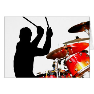 Bâtons de batteur dans fûts d'ombre d'air de vrais